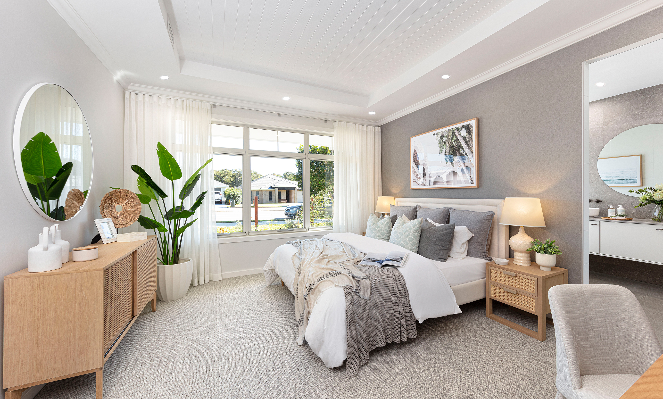 Coastal styled Master Suite Bedroom with tranquil stone colours and natural linens and cottons to compliment the coastal styling throughout the Retreat at Waterford Living, by McDonald Jones