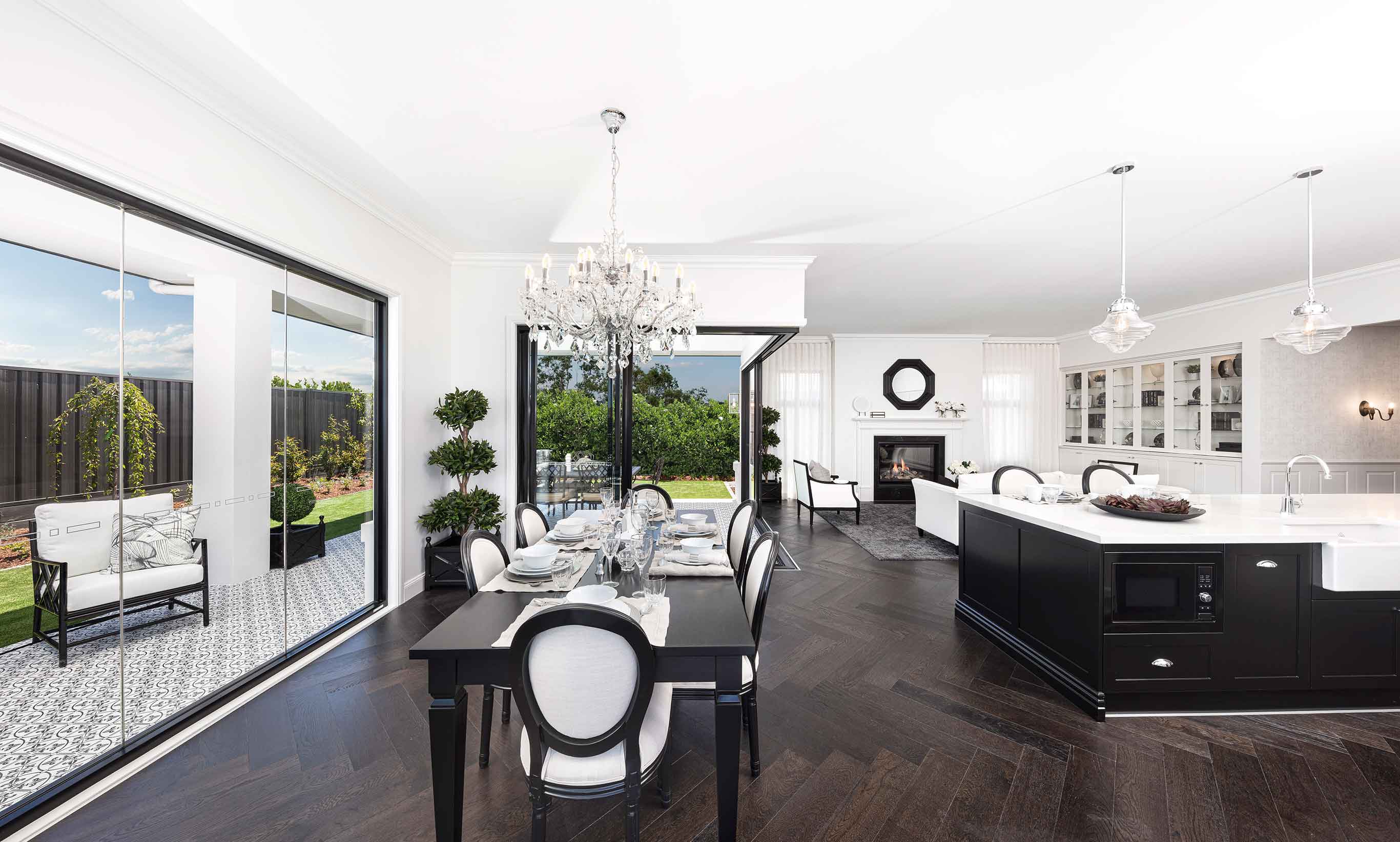 Luxe Parisian styling is centred on a combination of effortless elegance and highly functional spaces and furniture, often featuring a monochrome palette such as this striking home, The Cranbourne on display at Googong.