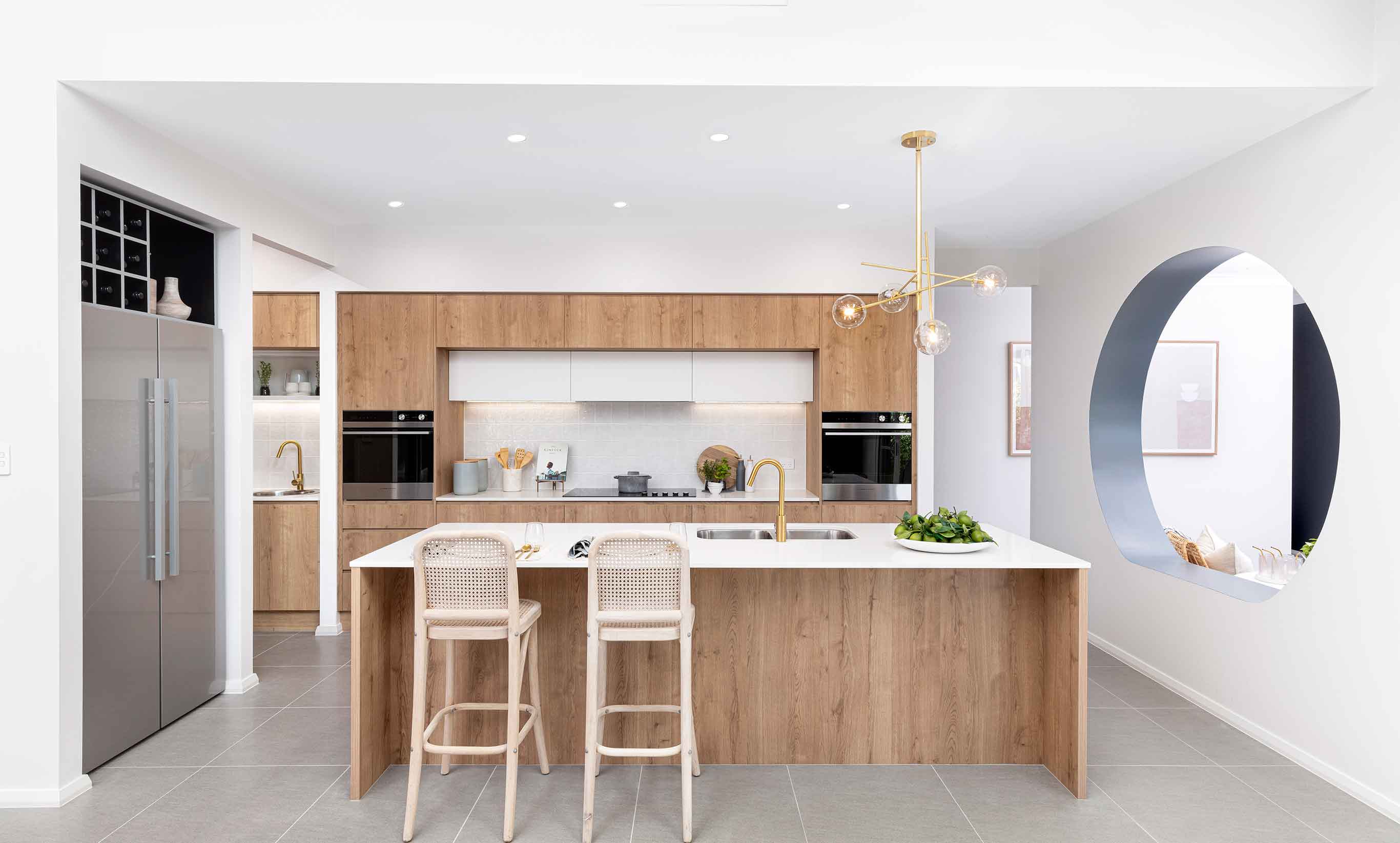 The Veuve Exective features a striking circular cut out connecting the Kitchen to the Children's Activity.