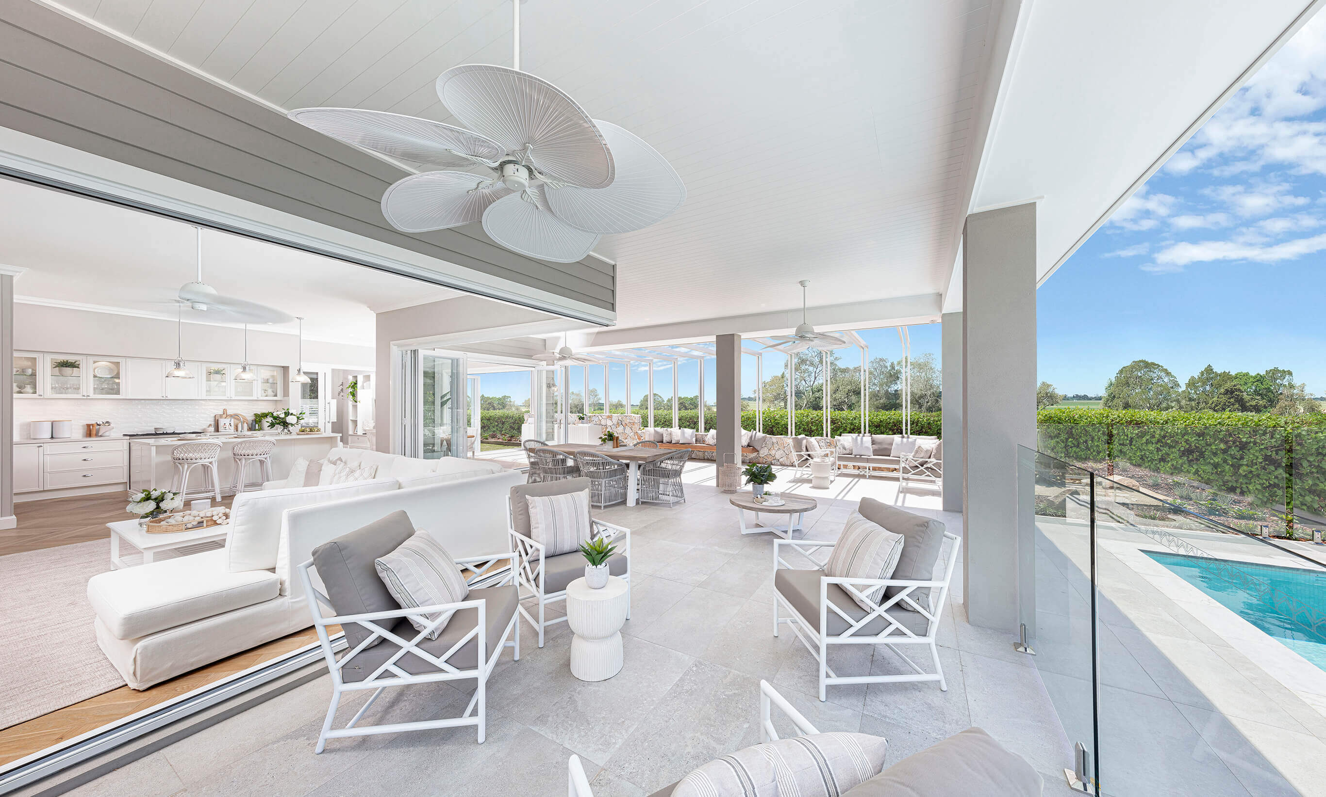 Coastal Beach House Alfresco Outdoor Living space beautifull styled with a crisp white and natural stone colour palette