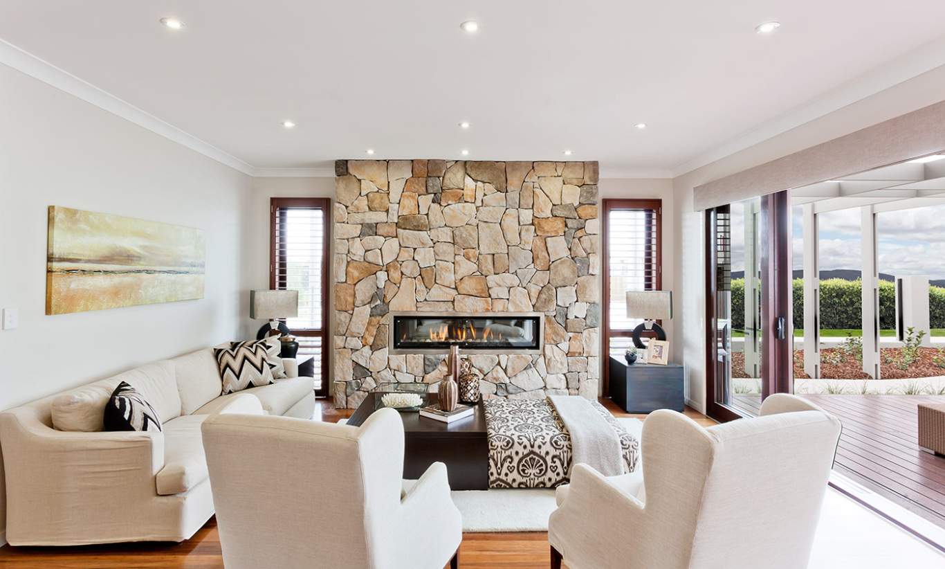 Fireplace in the living room. Huntingdale display home by McDonald Jones at Googong.