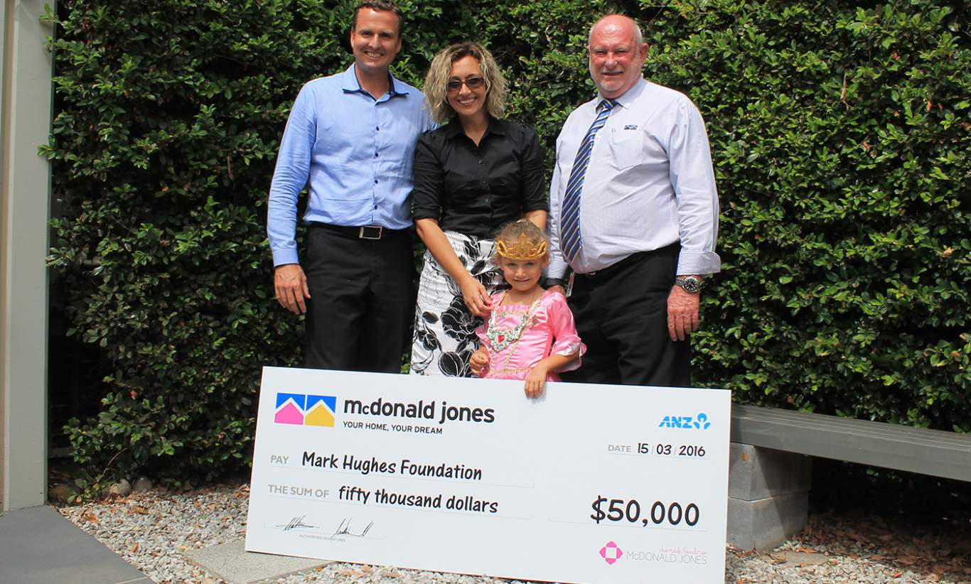 Mark Hughes Foundation receives donation from McDonald Jones Homes