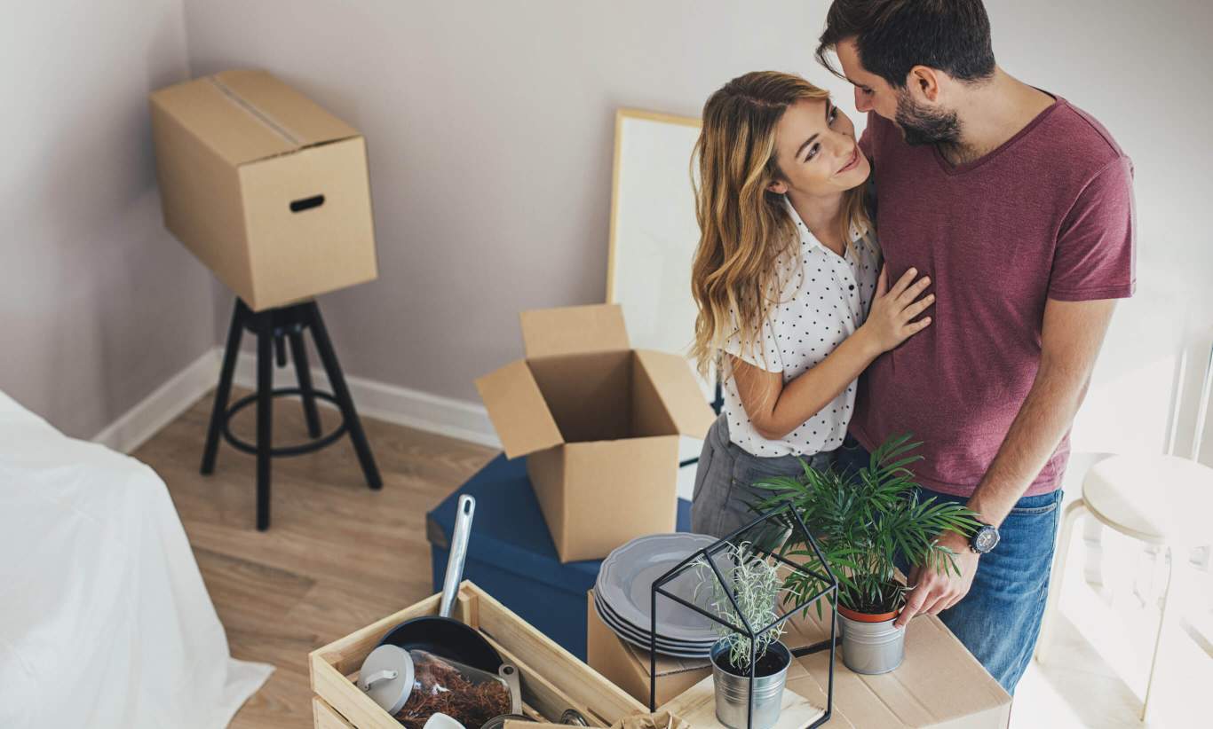 Brown cardboard boxes with house or office goods. Different stuff packed in carton boxes. Moving concept. 