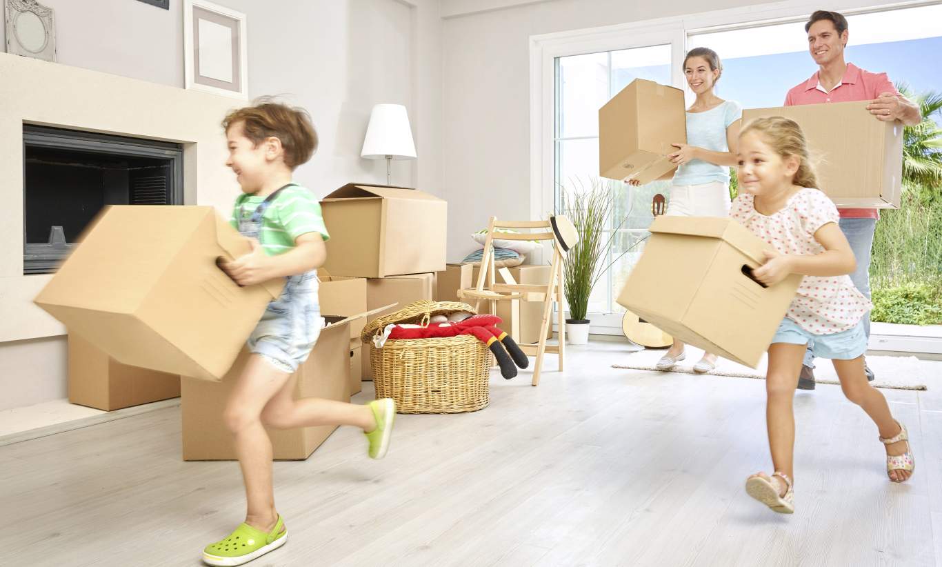 House moving concept. Closeup of family moving boxes.