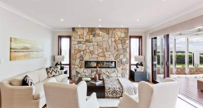 Fireplace in the living room. Huntingdale display home by McDonald Jones at Googong.