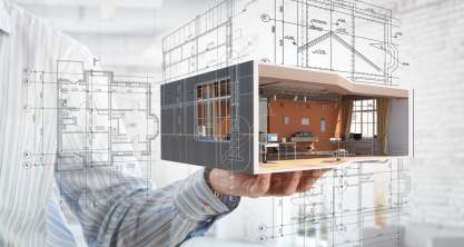 Creative home design graphic in a man’s hands