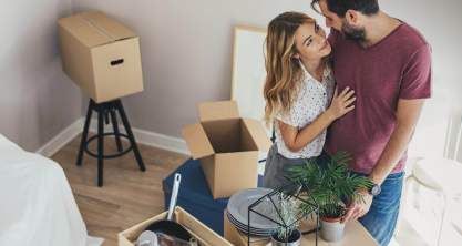 Brown cardboard boxes with house or office goods. Different stuff packed in carton boxes. Moving concept. 