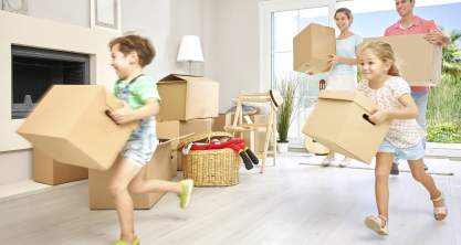 House moving concept. Closeup of family moving boxes.